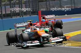 Nico Hulkenberg (GER) Sahara Force India F1 VJM05 leads Fernando Alonso (ESP) Ferrari F2012. 24.06.2012. Formula 1 World Championship, Rd 8, European Grand Prix, Valencia, Spain, Race Day