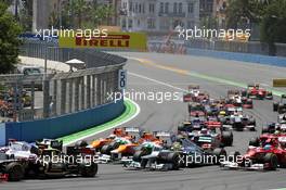(L to R): Paul di Resta (GBR) Sahara Force India VJM05; Nico Hulkenberg (GER) Sahara Force India F1 VJM05 Nico Rosberg (GER) Mercedes AMG F1 W03 and Fernando Alonso (ESP) Ferrari F2012 at the start of the race. 24.06.2012. Formula 1 World Championship, Rd 8, European Grand Prix, Valencia, Spain, Race Day