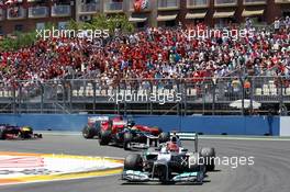 Michael Schumacher (GER) Mercedes AMG F1 W03 leads Bruno Senna (BRA) Williams FW34 and Fernando Alonso (ESP) Ferrari F2012. 24.06.2012. Formula 1 World Championship, Rd 8, European Grand Prix, Valencia, Spain, Race Day