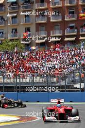 Fernando Alonso (ESP) Ferrari F2012 leads Kimi Raikkonen (FIN) Lotus F1 E20. 24.06.2012. Formula 1 World Championship, Rd 8, European Grand Prix, Valencia, Spain, Race Day