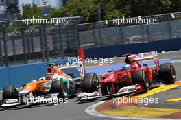 (L to R): Nico Hulkenberg (GER) Sahara Force India F1 VJM05 and Fernando Alonso (ESP) Ferrari F2012 battle for position. 24.06.2012. Formula 1 World Championship, Rd 8, European Grand Prix, Valencia, Spain, Race Day