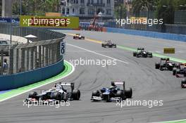 Sergio Perez (MEX) Sauber C31 and Bruno Senna (BRA) Williams FW34. 24.06.2012. Formula 1 World Championship, Rd 8, European Grand Prix, Valencia, Spain, Race Day