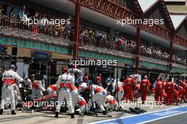 Lewis Hamilton (GBR) McLaren MP4/27 makes a slow pit stop. 24.06.2012. Formula 1 World Championship, Rd 8, European Grand Prix, Valencia, Spain, Race Day