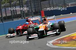 Nico Hulkenberg (GER) Sahara Force India F1 VJM05 and Fernando Alonso (ESP) Ferrari F2012. 24.06.2012. Formula 1 World Championship, Rd 8, European Grand Prix, Valencia, Spain, Race Day