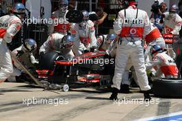 Lewis Hamilton (GBR) McLaren MP4/27 makes a slow pit stop. 24.06.2012. Formula 1 World Championship, Rd 8, European Grand Prix, Valencia, Spain, Race Day