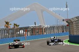 (L to R): Romain Grosjean (FRA) Lotus F1 E20 and Bruno Senna (BRA) Williams FW34. 23.06.2012. Formula 1 World Championship, Rd 8, European Grand Prix, Valencia, Spain, Qualifying Day