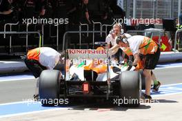 Paul di Resta (GBR) Sahara Force India VJM05 pushed back in the pits. 23.06.2012. Formula 1 World Championship, Rd 8, European Grand Prix, Valencia, Spain, Qualifying Day