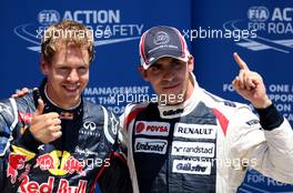 Sebastian Vettel (GER), Red Bull Racing and Pastor Maldonado (VEN), Williams F1 Team  23.06.2012. Formula 1 World Championship, Rd 8, European Grand Prix, Valencia, Spain, Qualifying Day