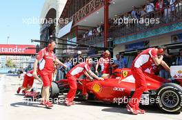 Fernando Alonso (ESP) Ferrari F2012 in the pits. 23.06.2012. Formula 1 World Championship, Rd 8, European Grand Prix, Valencia, Spain, Qualifying Day
