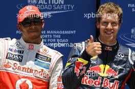 pole postion for Sebastian Vettel (GER), Red Bull Racing with Lewis Hamilton (GBR), McLaren Mercedes in 2nd place  23.06.2012. Formula 1 World Championship, Rd 8, European Grand Prix, Valencia, Spain, Qualifying Day