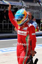 Fernando Alonso (ESP) Ferrari waves to the crowd after being knocked out in Q2. 23.06.2012. Formula 1 World Championship, Rd 8, European Grand Prix, Valencia, Spain, Qualifying Day