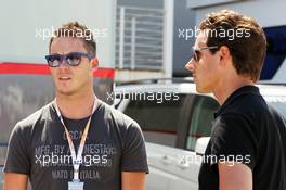 (L to R): Andre Lotterer (GER) with Adrian Sutil (GER). 23.06.2012. Formula 1 World Championship, Rd 8, European Grand Prix, Valencia, Spain, Qualifying Day