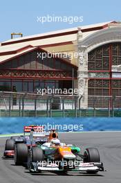 Paul di Resta (GBR) Sahara Force India VJM05 leads Lewis Hamilton (GBR) McLaren MP4/27. 23.06.2012. Formula 1 World Championship, Rd 8, European Grand Prix, Valencia, Spain, Qualifying Day