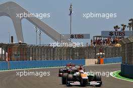 Paul di Resta (GBR) Sahara Force India VJM05 leads Lewis Hamilton (GBR) McLaren MP4/27. 23.06.2012. Formula 1 World Championship, Rd 8, European Grand Prix, Valencia, Spain, Qualifying Day