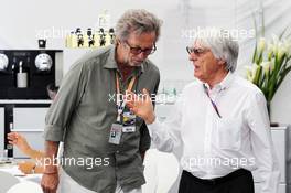 (L to R): Eric Clapton (GBR) Rock Legend with Bernie Ecclestone (GBR) CEO Formula One Group (FOM). 24.06.2012. Formula 1 World Championship, Rd 8, European Grand Prix, Valencia, Spain, Race Day