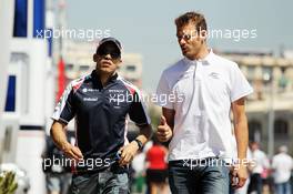 (L to R): Pastor Maldonado (VEN) Williams with Alex Wurz (AUT) Alex Wurz (AUT) Williams Driver Mentor. 24.06.2012. Formula 1 World Championship, Rd 8, European Grand Prix, Valencia, Spain, Race Day