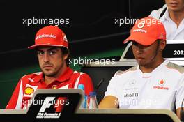 (L to R): Fernando Alonso (ESP) Ferrari and Lewis Hamilton (GBR) McLaren in the FIA Press Conference. 21.06.2012. Formula 1 World Championship, Rd 8, European Grand Prix, Valencia, Spain, Preparation Day