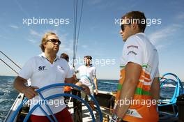 (L to R): Robert Fearnley (GBR) Sahara Force India F1 Team Deputy Team Principal with Paul di Resta (GBR) Sahara Force India F1 on the Aethra America's Cup Boat. 21.06.2012. Formula 1 World Championship, Rd 8, European Grand Prix, Valencia, Spain, Preparation Day