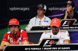 (L to R): Fernando Alonso (ESP) Ferrari and Lewis Hamilton (GBR) McLaren in the FIA Press Conference. 21.06.2012. Formula 1 World Championship, Rd 8, European Grand Prix, Valencia, Spain, Preparation Day