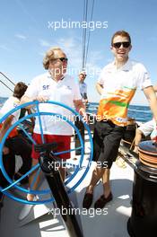 (L to R): Robert Fearnley (GBR) Sahara Force India F1 Team Deputy Team Principal with Paul di Resta (GBR) Sahara Force India F1 on the Aethra America's Cup Boat. 21.06.2012. Formula 1 World Championship, Rd 8, European Grand Prix, Valencia, Spain, Preparation Day