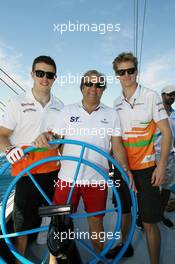 (L to R): Paul di Resta (GBR) Sahara Force India F1 with Robert Fearnley (GBR) Sahara Force India F1 Team Deputy Team Principal and Nico Hulkenberg (GER) Sahara Force India F1 on the Aethra America's Cup Boat. 21.06.2012. Formula 1 World Championship, Rd 8, European Grand Prix, Valencia, Spain, Preparation Day