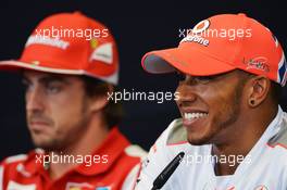 Lewis Hamilton (GBR) McLaren and Fernando Alonso (ESP) Ferrari in the FIA Press Conference. 21.06.2012. Formula 1 World Championship, Rd 8, European Grand Prix, Valencia, Spain, Preparation Day
