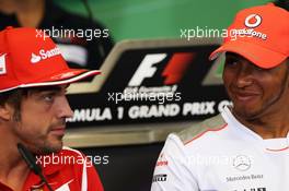 (L to R): Fernando Alonso (ESP) Ferrari with Lewis Hamilton (GBR) McLaren in the FIA Press Conference. 21.06.2012. Formula 1 World Championship, Rd 8, European Grand Prix, Valencia, Spain, Preparation Day