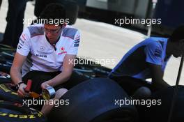 McLaren mechanic with Pirelli tyres. 21.06.2012. Formula 1 World Championship, Rd 8, European Grand Prix, Valencia, Spain, Preparation Day