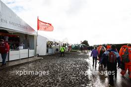 A wet and muddy merchandise area. 06.07.2012. Formula 1 World Championship, Rd 9, British Grand Prix, Silverstone, England, Practice Day