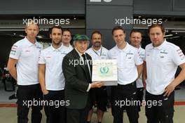 Jackie Stewart (GBR) supports the Grand Prix Mechanics Charitable Trust 25 Year Anniversary with the the Mercedes AMG F1 team. 05.07.2012. Formula 1 World Championship, Rd 9, British Grand Prix, Silverstone, England, Preparation Day