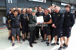 Jackie Stewart (GBR) supports the Grand Prix Mechanics Charitable Trust 25 Year Anniversary with the Hispania Racing F1 Team (HRT). 05.07.2012. Formula 1 World Championship, Rd 9, British Grand Prix, Silverstone, England, Preparation Day