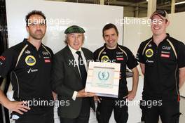 Jackie Stewart (GBR) supports the Grand Prix Mechanics Charitable Trust 25 Year Anniversary with the Lotus F1 Team. 05.07.2012. Formula 1 World Championship, Rd 9, British Grand Prix, Silverstone, England, Preparation Day