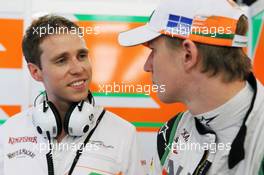(L to R): Will Hings (GBR) Sahara Force India F1 Press Officer with Nico Hulkenberg (GER) Sahara Force India F1. 06.07.2012. Formula 1 World Championship, Rd 9, British Grand Prix, Silverstone, England, Practice Day