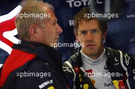 (L to R): Dr Helmut Marko (AUT) Red Bull Motorsport Consultant with Sebastian Vettel (GER) Red Bull Racing. 06.07.2012. Formula 1 World Championship, Rd 9, British Grand Prix, Silverstone, England, Practice Day