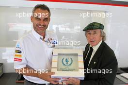 Jackie Stewart (GBR) supports the Grand Prix Mechanics Charitable Trust 25 Year Anniversary with Beat Zehnder (SUI) Sauber F1 Team Manager. 05.07.2012. Formula 1 World Championship, Rd 9, British Grand Prix, Silverstone, England, Preparation Day