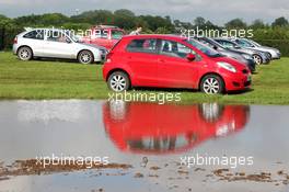 Wet and muddy car parks and camp sites at the circuit. 06.07.2012. Formula 1 World Championship, Rd 9, British Grand Prix, Silverstone, England, Practice Day