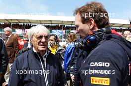 (L to R): Bernie Ecclestone (GBR) CEO Formula One Group (FOM) with Christian Horner (GBR) Red Bull Racing Team Principal on the grid. 08.07.2012. Formula 1 World Championship, Rd 9, British Grand Prix, Silverstone, England, Race Day