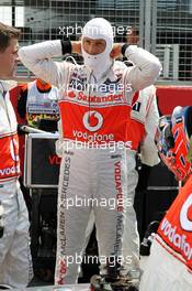 Jenson Button (GBR) McLaren on the grid. 08.07.2012. Formula 1 World Championship, Rd 9, British Grand Prix, Silverstone, England, Race Day