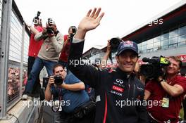 Race winner Mark Webber (AUS) Red Bull Racing celebrates after the race. 08.07.2012. Formula 1 World Championship, Rd 9, British Grand Prix, Silverstone, England, Race Day