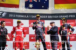 The podium (L to R): Fernando Alonso (ESP) Ferrari, second; Mark Webber (AUS) Red Bull Racing, race winner;Jackie Stewart (GBR); Sebastian Vettel (GER) Red Bull Racing, third. 08.07.2012. Formula 1 World Championship, Rd 9, British Grand Prix, Silverstone, England, Race Day
