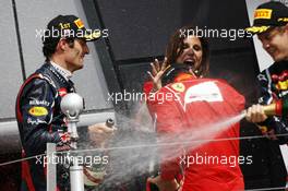 Race winner Mark Webber (AUS) Red Bull Racing celebrates on the podium with Fernando Alonso (ESP) Ferrari and Sebastian Vettel (GER) Red Bull Racing. 08.07.2012. Formula 1 World Championship, Rd 9, British Grand Prix, Silverstone, England, Race Day