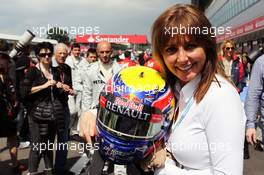Carol Vordermann (GBR) TV Presenter with the helmet of race winner Mark Webber (AUS) Red Bull Racing. 08.07.2012. Formula 1 World Championship, Rd 9, British Grand Prix, Silverstone, England, Race Day