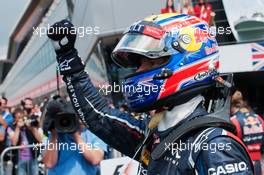 Race winner Mark Webber (AUS) Red Bull Racing celebrates in parc ferme. 08.07.2012. Formula 1 World Championship, Rd 9, British Grand Prix, Silverstone, England, Race Day