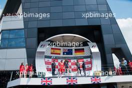 The podium (L to R): Fernando Alonso (ESP) Ferrari, second; Mark Webber (AUS) Red Bull Racing, race winner; Sebastian Vettel (GER) Red Bull Racing, third.. 08.07.2012. Formula 1 World Championship, Rd 9, British Grand Prix, Silverstone, England, Race Day