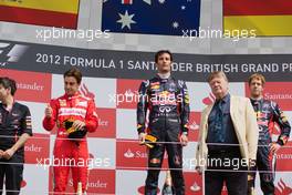 The podium (L to R): Fernando Alonso (ESP) Ferrari, second; Mark Webber (AUS) Red Bull Racing, race winner; Sebastian Vettel (GER) Red Bull Racing, third. 08.07.2012. Formula 1 World Championship, Rd 9, British Grand Prix, Silverstone, England, Race Day