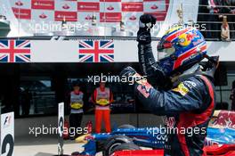 Race winner Mark Webber (AUS) Red Bull Racing celebrates in parc ferme. 08.07.2012. Formula 1 World Championship, Rd 9, British Grand Prix, Silverstone, England, Race Day