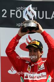 Fernando Alonso (ESP) Ferrari celebrates his second position on the podium. 08.07.2012. Formula 1 World Championship, Rd 9, British Grand Prix, Silverstone, England, Race Day