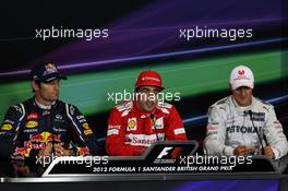 Post qualifying FIA Press Conference (L to R): Mark Webber (AUS) Red Bull Racing, second; Fernando Alonso (ESP) Ferrari, pole position; Michael Schumacher (GER) Mercedes AMG F1, third. 07.07.2012. Formula 1 World Championship, Rd 9, British Grand Prix, Silverstone, England, Qualifying Day