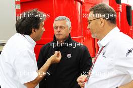 (L to R): Pasquale Lattuneddu (ITA) of the FOM with Derek Warwick (GBR) BRDC President and Richard Phillips (GBR) CEO Silverstone. 07.07.2012. Formula 1 World Championship, Rd 9, British Grand Prix, Silverstone, England, Qualifying Day