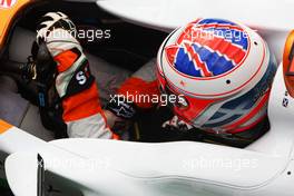 Paul di Resta (GBR) Sahara Force India VJM05 wears a helmet onhis helmet for Maria De Villota (ESP) Marussia F1 Team Test Driver. 07.07.2012. Formula 1 World Championship, Rd 9, British Grand Prix, Silverstone, England, Qualifying Day